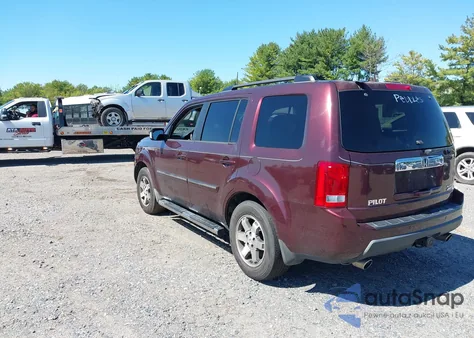 2009 Honda Pilot Touring z USA, uszkodzony, nr VIN 5FNYF48939B005946